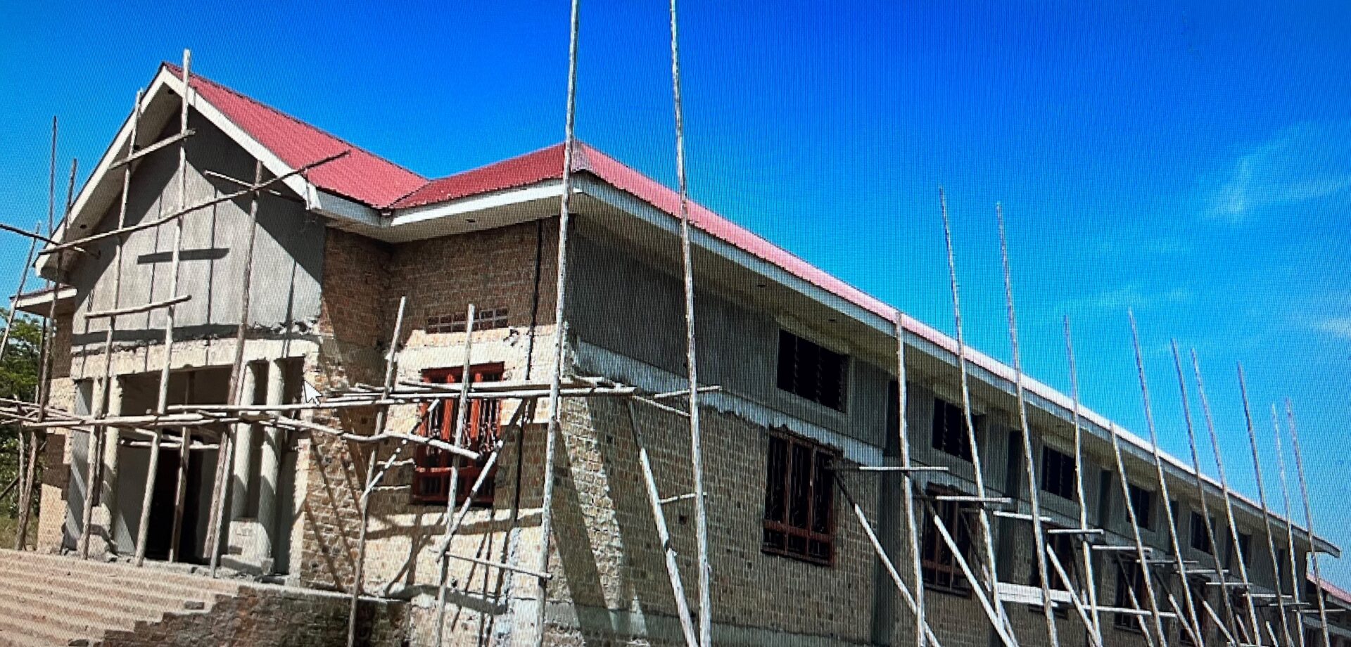 A Building With Wooden Logs for Renovation