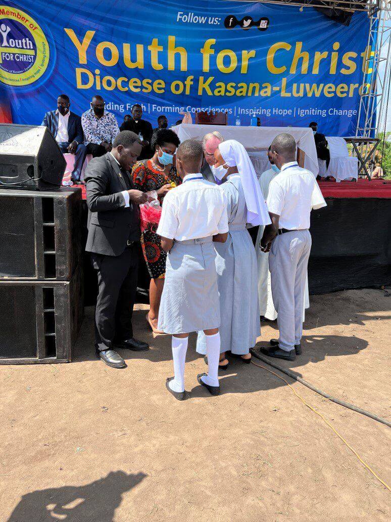 Students and clergy at Youth for Christ stage